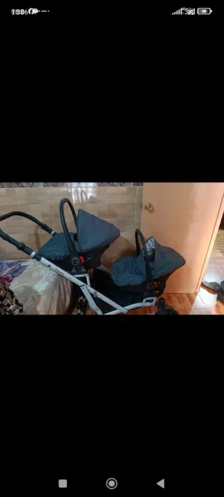 Carro gemelar con dos sillas