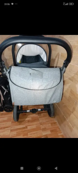 Carro gemelar con dos sillas