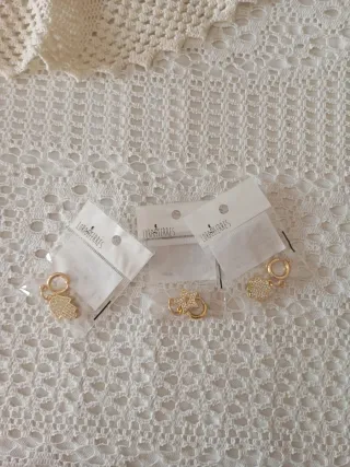 Ganci decorativi dorati con ciondoli