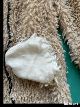 Giubbotto peloso beige