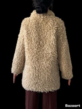 Giubbotto peloso beige