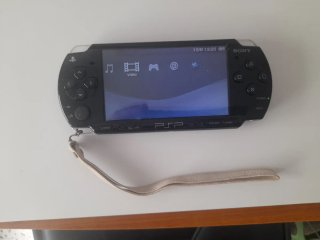 Consola Sony PSP 2004 + Funda + Cargador +Cable TV