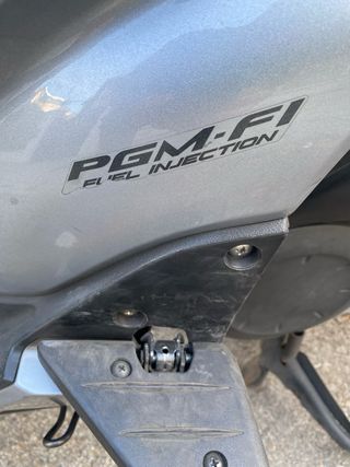 Honda SH300i Plata inyección electrónica PGM-F1