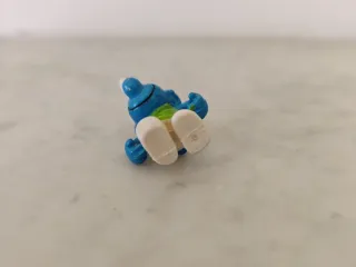 Pitufo azul con delantal verde