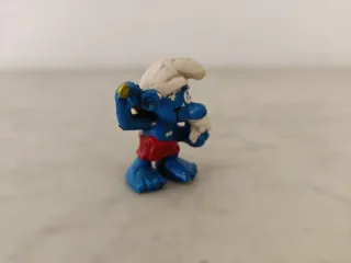 Pitufo duchandose