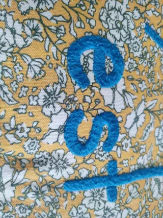 Cojín floral El Corte Inglés 55x25cm