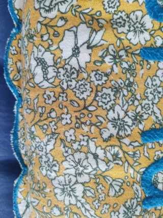 Cojín floral El Corte Inglés 55x25cm