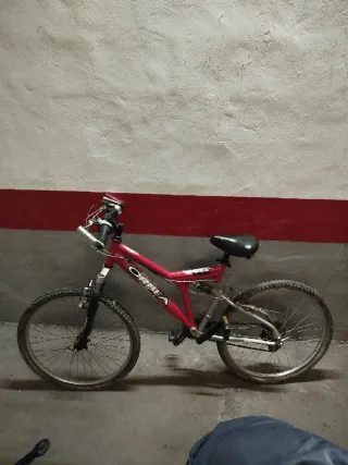 Bicicleta Orbea Roja Doble Suspensión