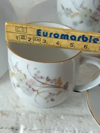 Servizio tazzine porcellana oro e bianco