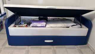 Cama nido azul y blanca como nueva. No de envía