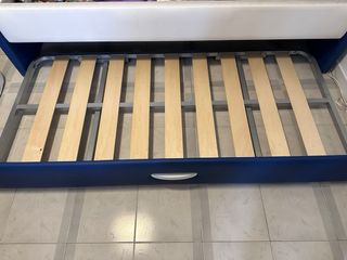 Cama nido azul y blanca como nueva. No de envía