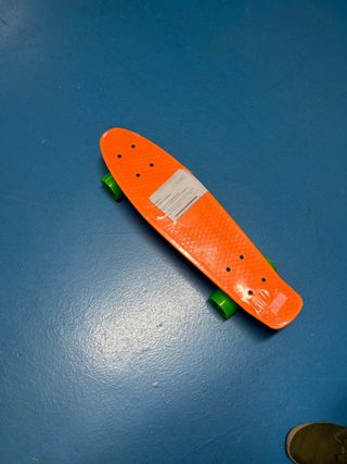 Skate Naranja con Ruedas Verdes