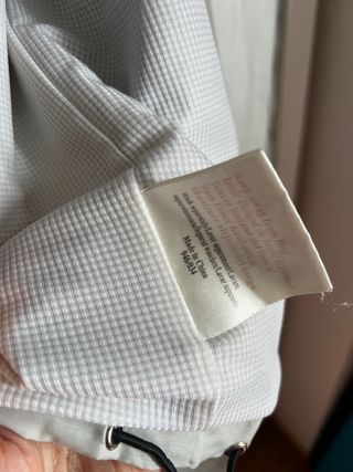 Chaqueta deportiva Umbro gris y roja