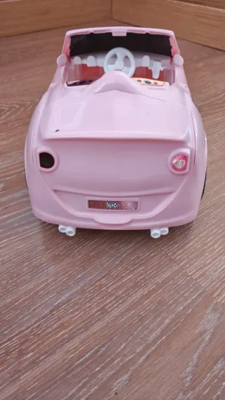 Coche rosa Nancy con muñeca