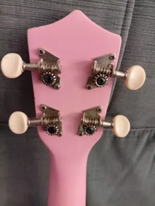 Ukelele rosa infantil