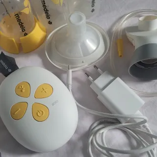 Sacaleches Medela Solo + embudos y bolsas (21)