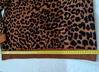 Jersey animal print negro y marrón. Mango.