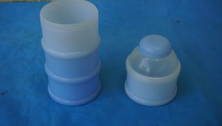 Bolso bebé, dosificador leche y apoya cabezas lote