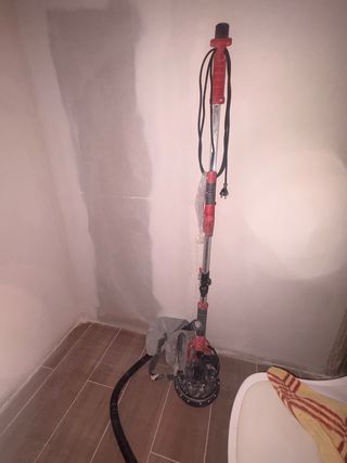 Lijadora jirafa marca Dovet con bolsa aspiradora