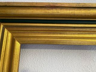 Marco de madera dorado