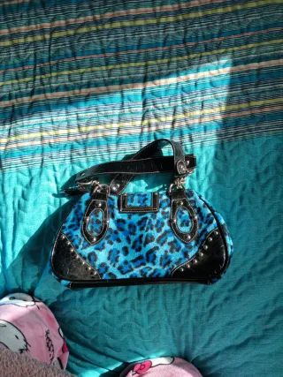 Bolso estampado animal print azul.no se envia