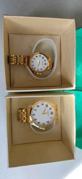 Relojes Exactime Dorados y Blancos