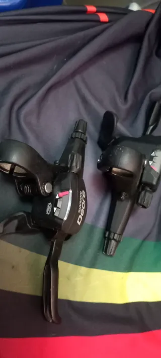 Manetes Shimano Deore Dual Control 9v