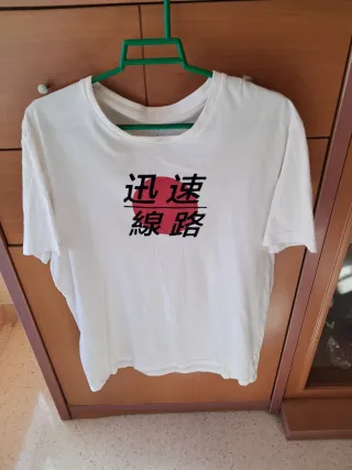 Lote de 8 camisetas de chico de diferentes marcas.