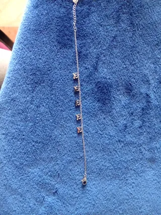 Pulsera de acero con adornos, Indalo