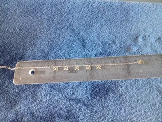 Pulsera de acero con adornos, Indalo