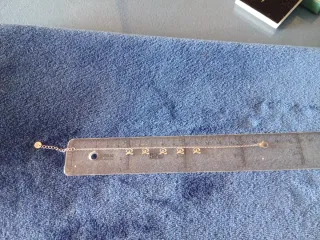 Pulsera de acero con adornos, Indalo