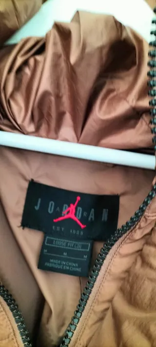 Chaqueta larga Nike plumas hombre invierno origina