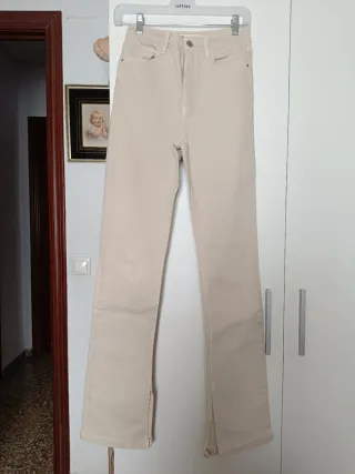Pantalones Zara beige con abertura