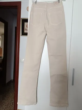 Pantalones Zara beige con abertura