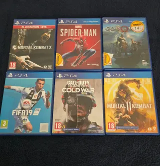 PS4 Slim Blanca + 2 Mandos + 6 Juegos