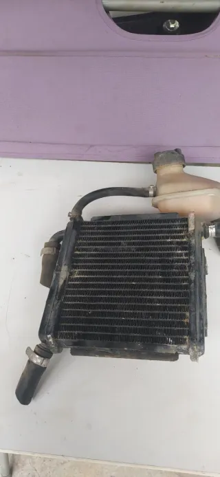 Radiador y bote Aprilia SR 49 Racing