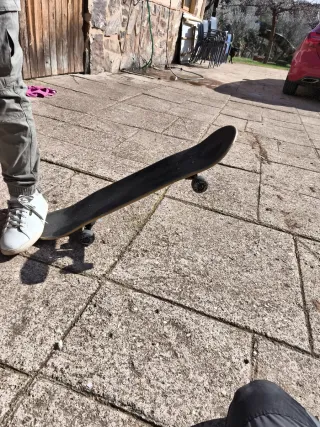 Skate Oxelo con diseño dorado