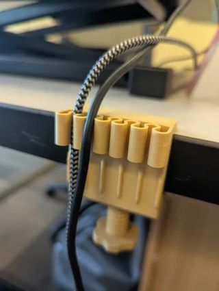 Organizador de cables para escritorio rosa