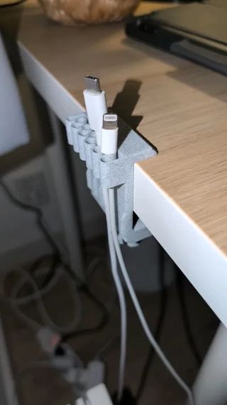 Organizador de cables para escritorio rosa