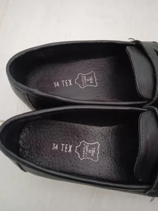 Zapatos negros tipo mocasín