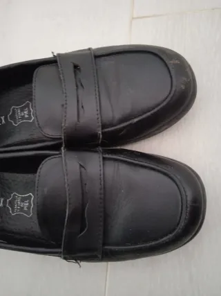 Zapatos negros tipo mocasín