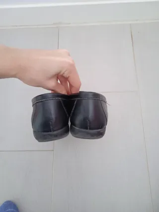 Zapatos negros tipo mocasín