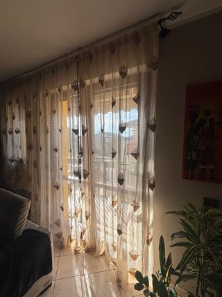 Tende beige con rombi marroni