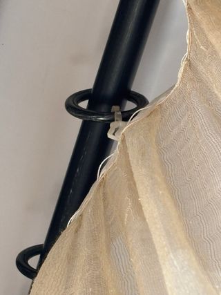 Tende beige con rombi marroni