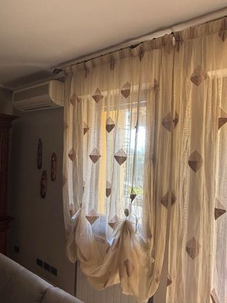 Tende beige con rombi marroni