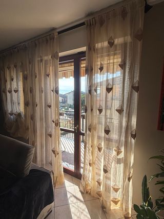 Tende beige con rombi marroni