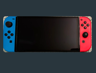 Nintendo Switch OLED Zelda TOTK + Funda + Amiibo