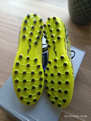 Botas de fútbol Joma multitaco amarillas