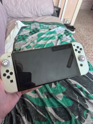 Nintendo Switch OLED + Mario Kart preinstallato