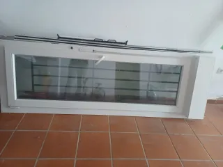 Puerta Kommerling Oscilobatiente con mosquitera